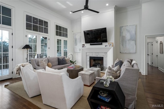 1901 Point Clear Rd, Tuscaloosa, AL 35406 - living room featuring french doors, a fireplace, wood finished floors, and crown molding