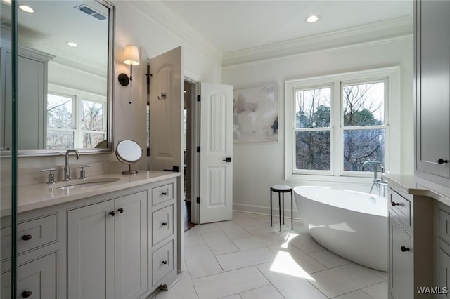 1901 Point Clear Rd, Tuscaloosa, AL 35406 - full bathroom with a freestanding bath, visible vents, crown molding, and vanity