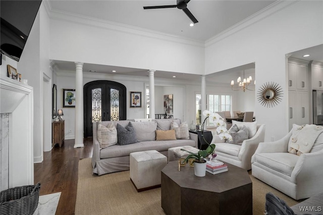 1901 Point Clear Rd, Tuscaloosa, AL 35406 - living room featuring ornamental molding, french doors, wood finished floors, and ornate columns