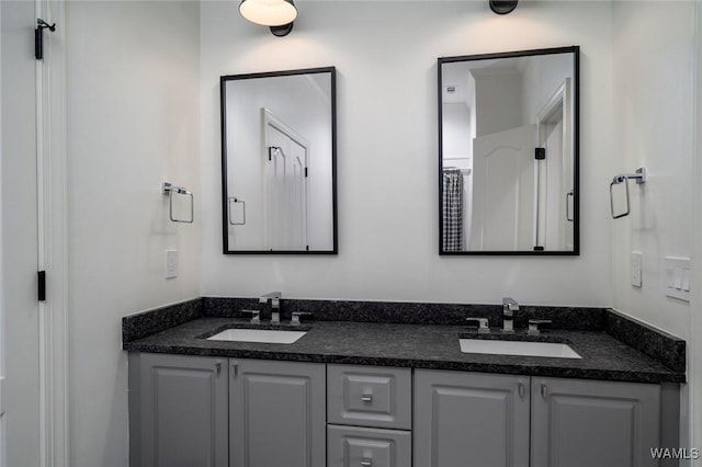 1901 Point Clear Rd, Tuscaloosa, AL 35406 - full bathroom featuring a sink and double vanity