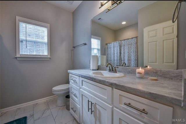 17818 Alecia Dr, Vance, AL 35490 - full bathroom featuring marble look tiles, toilet, vanity, baseboards, and recessed lighting
