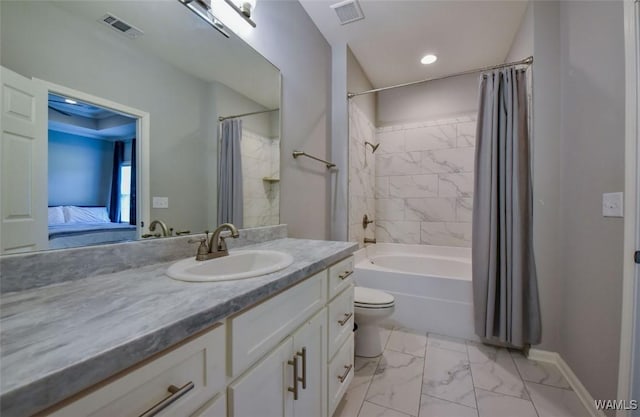 17818 Alecia Dr, Vance, AL 35490 - bathroom with marble finish floors, vanity, shower / tub combo, toilet, and baseboards