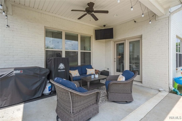 11210 Davis Pl, Northport, AL 35475 - view of patio with an outdoor hangout area, a ceiling fan, and area for grilling