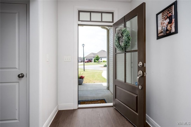 11210 Davis Pl, Northport, AL 35475 - entrance foyer featuring baseboards and dark wood finished floors