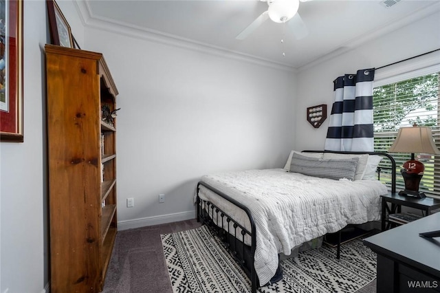 11210 Davis Pl, Northport, AL 35475 - carpeted bedroom with crown molding and ceiling fan