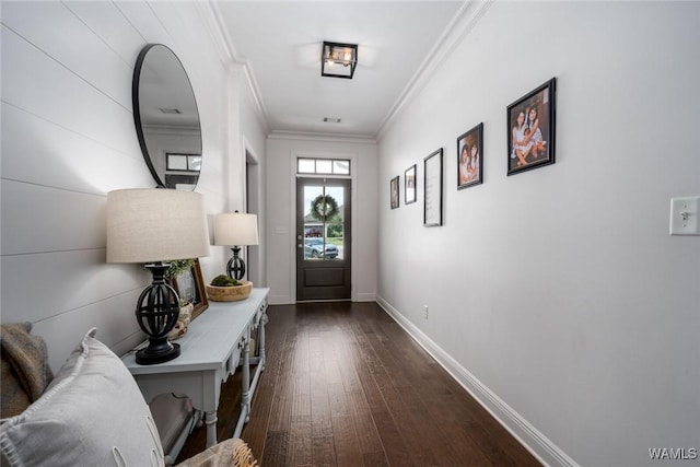11210 Davis Pl, Northport, AL 35475 - foyer with ornamental molding and dark wood finished floors
