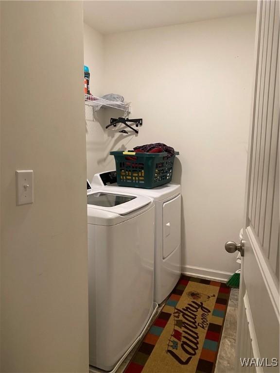 clothes washing area featuring washing machine and dryer