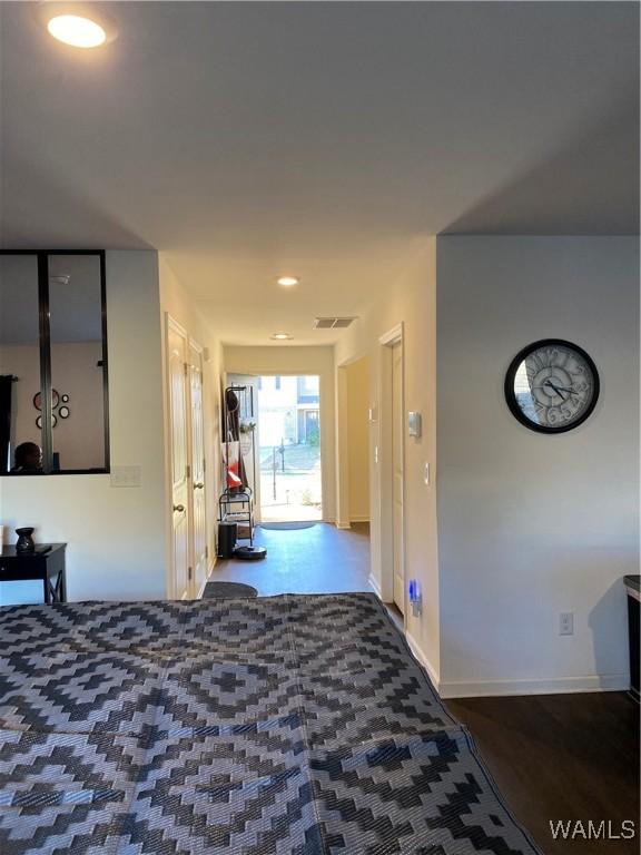 bedroom featuring wood-type flooring