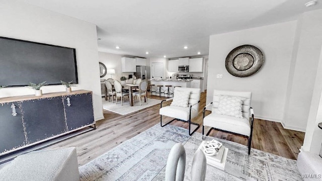 living room featuring light hardwood / wood-style flooring