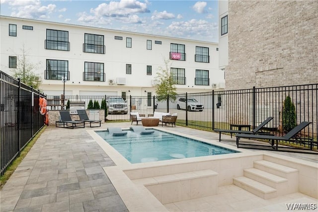 view of pool with a patio