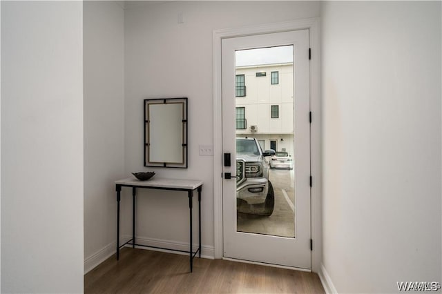 doorway featuring hardwood / wood-style flooring