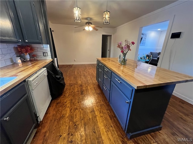 kitchen with hanging light fixtures, butcher block countertops, blue cabinets, and white dishwasher