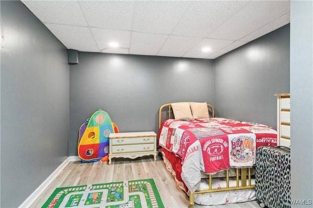 15551 Oakwood Dr, Brookwood, AL 35444 - bedroom with wood finished floors, a drop ceiling, and recessed lighting