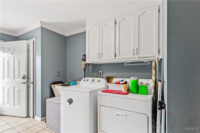 15551 Oakwood Dr, Brookwood, AL 35444 - laundry room featuring separate washer and dryer, cabinet space, crown molding, and light tile patterned floors