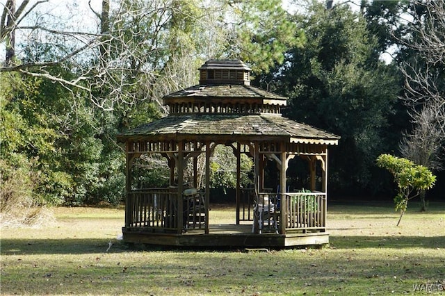 view of community featuring a gazebo and a yard