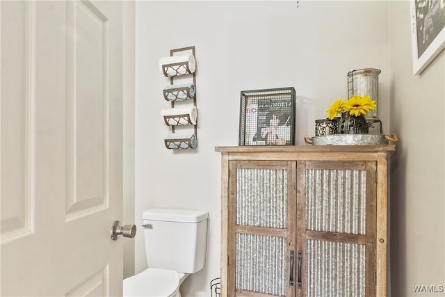 bathroom featuring toilet