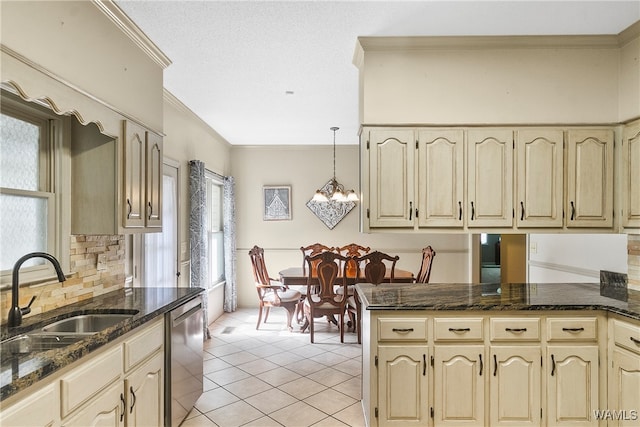 kitchen with dishwasher, crown molding, sink, hanging light fixtures, and kitchen peninsula