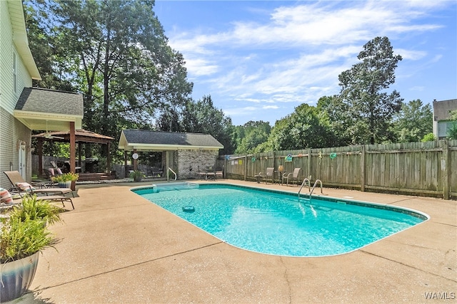 view of pool featuring a gazebo and a patio area