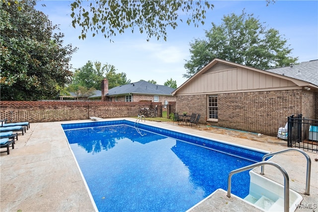 view of pool with a patio area