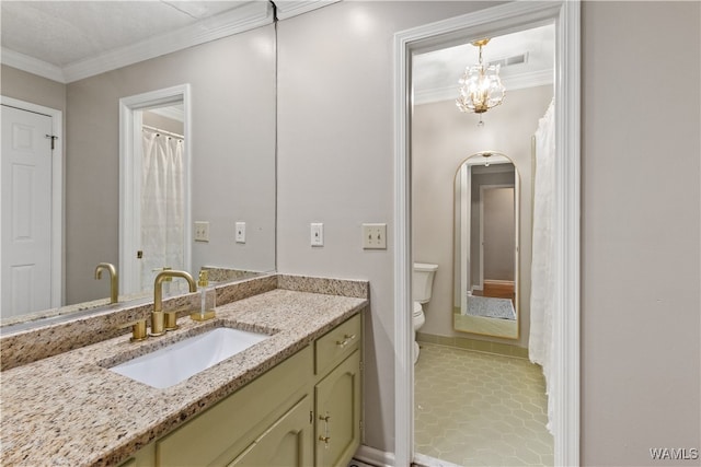 bathroom featuring vanity, tile patterned floors, toilet, ornamental molding, and a notable chandelier