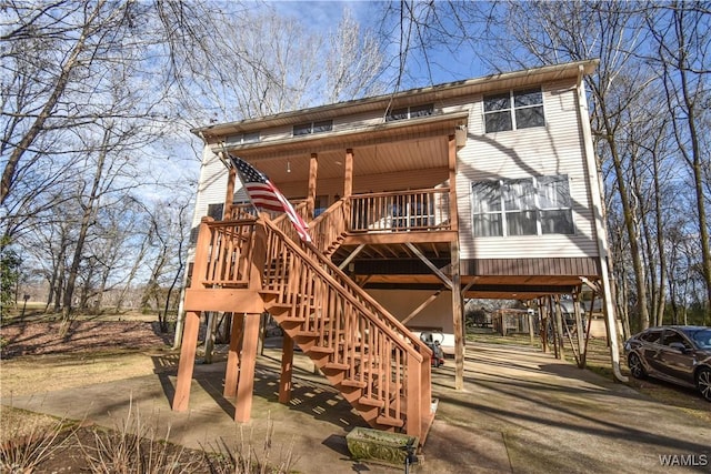 rear view of house featuring a patio area