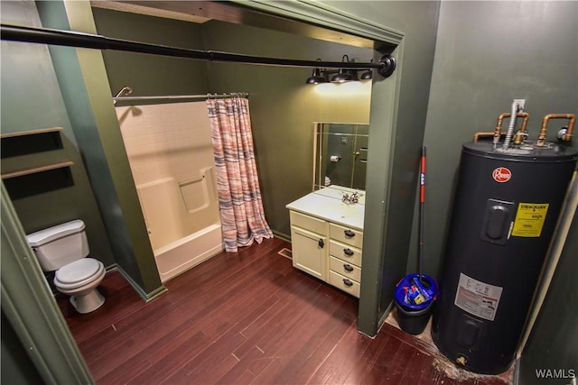 full bathroom featuring water heater, toilet, shower / bath combo, wood-type flooring, and vanity