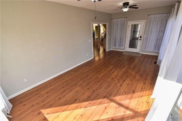 interior space featuring ceiling fan and hardwood / wood-style flooring