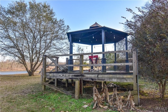 deck featuring a water view