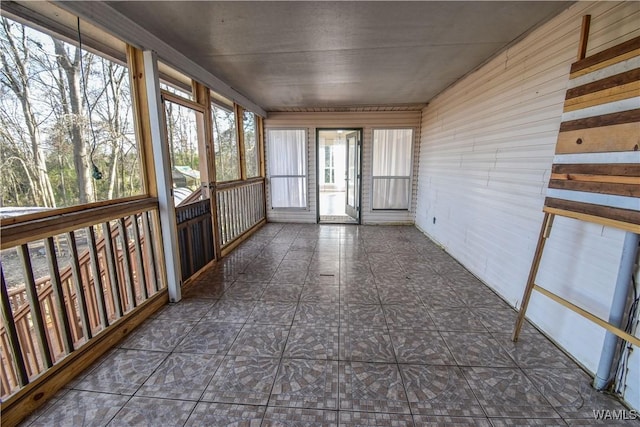 view of unfurnished sunroom