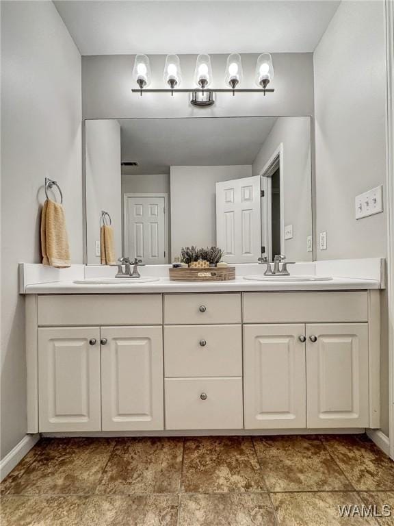 1851 Russet Woods Ln, Hoover, AL 35244 - bathroom featuring baseboards and double vanity