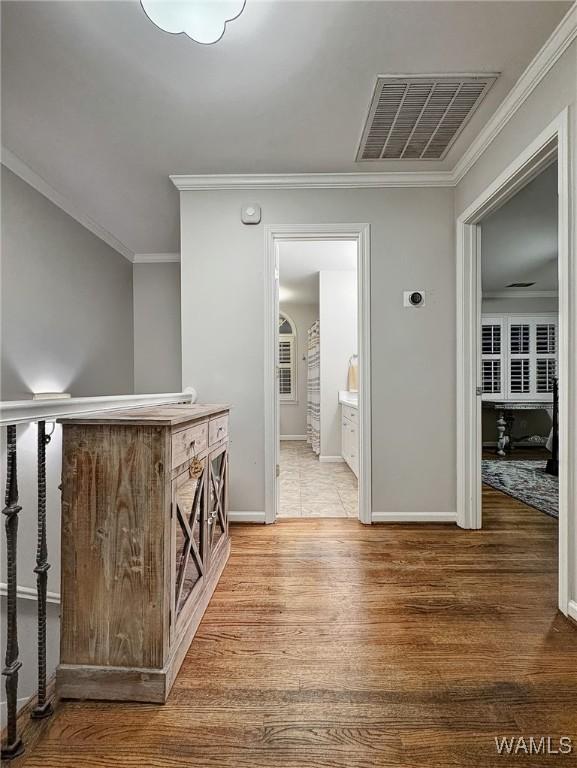 1851 Russet Woods Ln, Hoover, AL 35244 - hallway with wood finished floors, baseboards, and ornamental molding