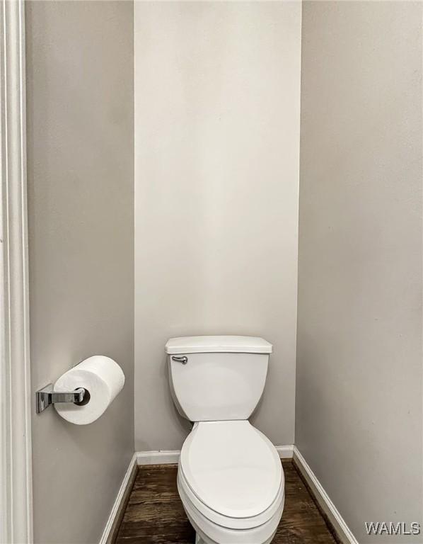 1851 Russet Woods Ln, Hoover, AL 35244 - bathroom with wood finished floors, baseboards, and toilet