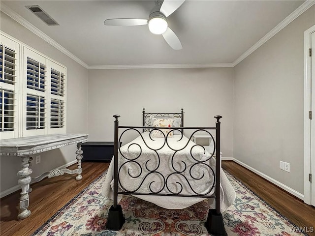 1851 Russet Woods Ln, Hoover, AL 35244 - bedroom featuring wood finished floors, ornamental molding, baseboards, and a ceiling fan