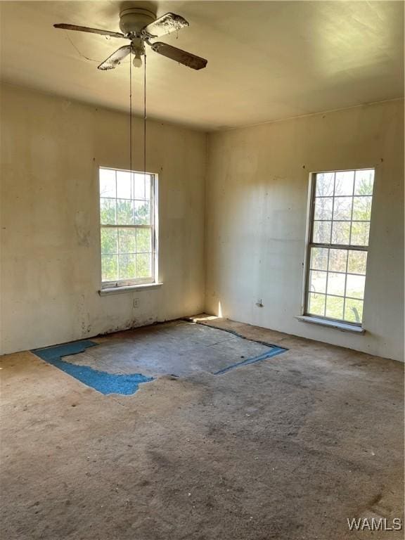 empty room with a ceiling fan