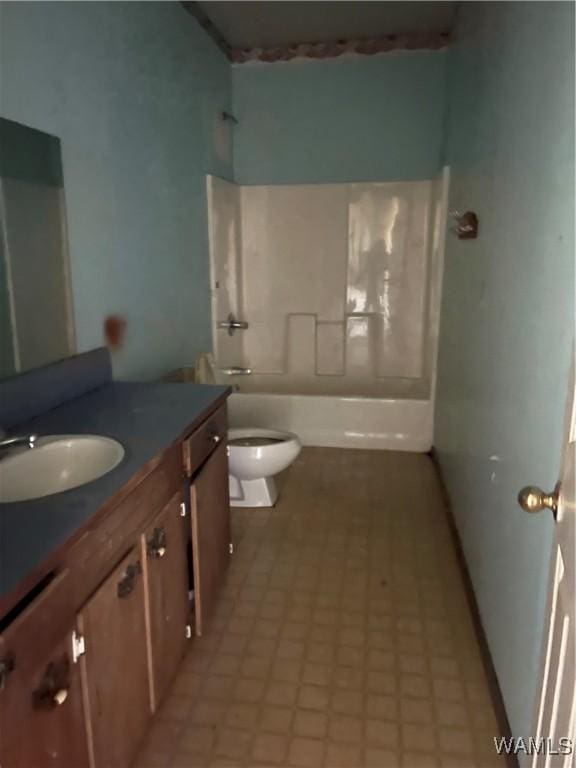 bathroom featuring toilet, vanity, shower / bathing tub combination, and tile patterned floors