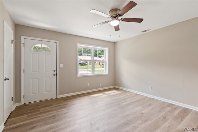 foyer featuring ceiling fan and light wood-type flooring