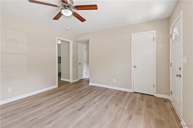 spare room with ceiling fan and light hardwood / wood-style flooring