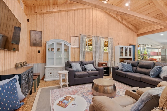 living room with beam ceiling, high vaulted ceiling, wood ceiling, and light colored carpet