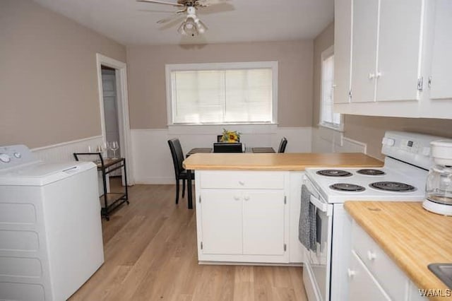 kitchen featuring washer / dryer, white cabinetry, white electric stove, ceiling fan, and light hardwood / wood-style floors