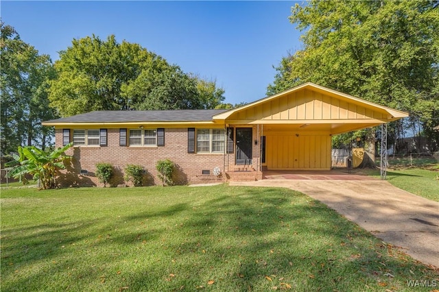 ranch-style house with a carport and a front lawn