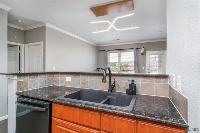 kitchen with dishwasher, sink, tasteful backsplash, dark stone countertops, and crown molding