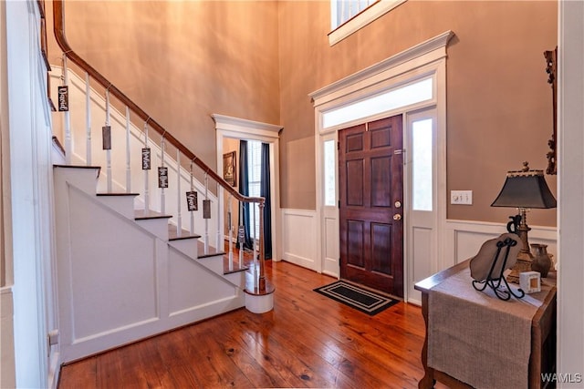 foyer entrance with wood-type flooring