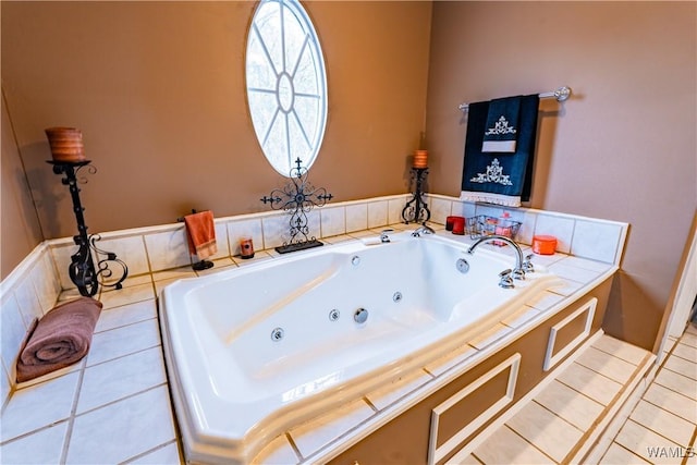 bathroom featuring a bathtub and tile patterned flooring