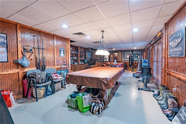 playroom featuring billiards and wood walls