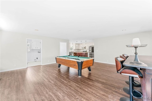 playroom with billiards, recessed lighting, wood finished floors, and baseboards