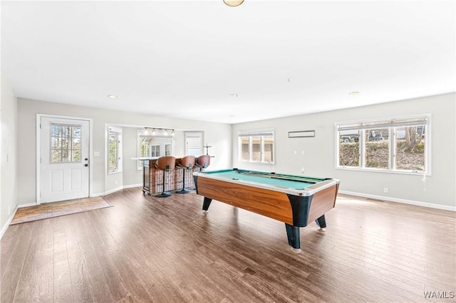 game room with baseboards, a healthy amount of sunlight, wood finished floors, and billiards