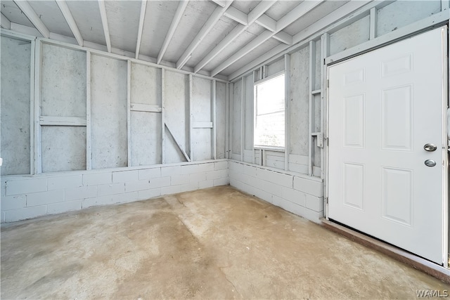 interior space with concrete flooring