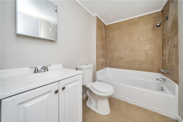 full bathroom featuring tile patterned flooring, vanity, toilet, and tiled shower / bath