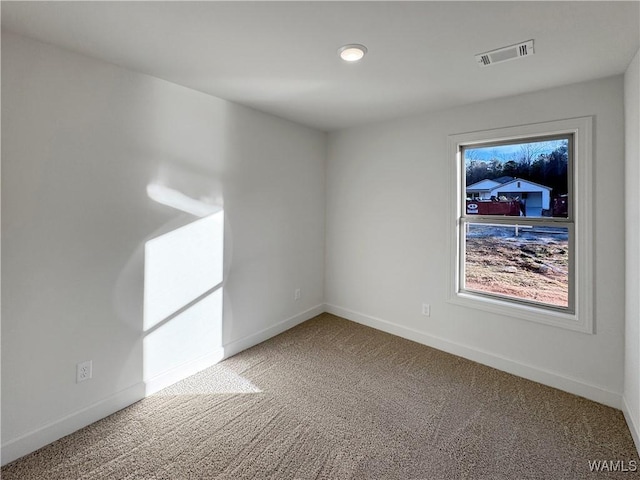 empty room featuring carpet