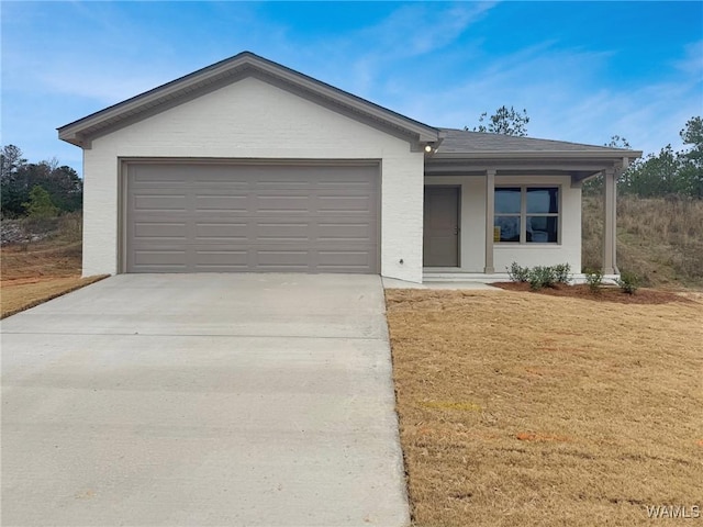 ranch-style house featuring a garage